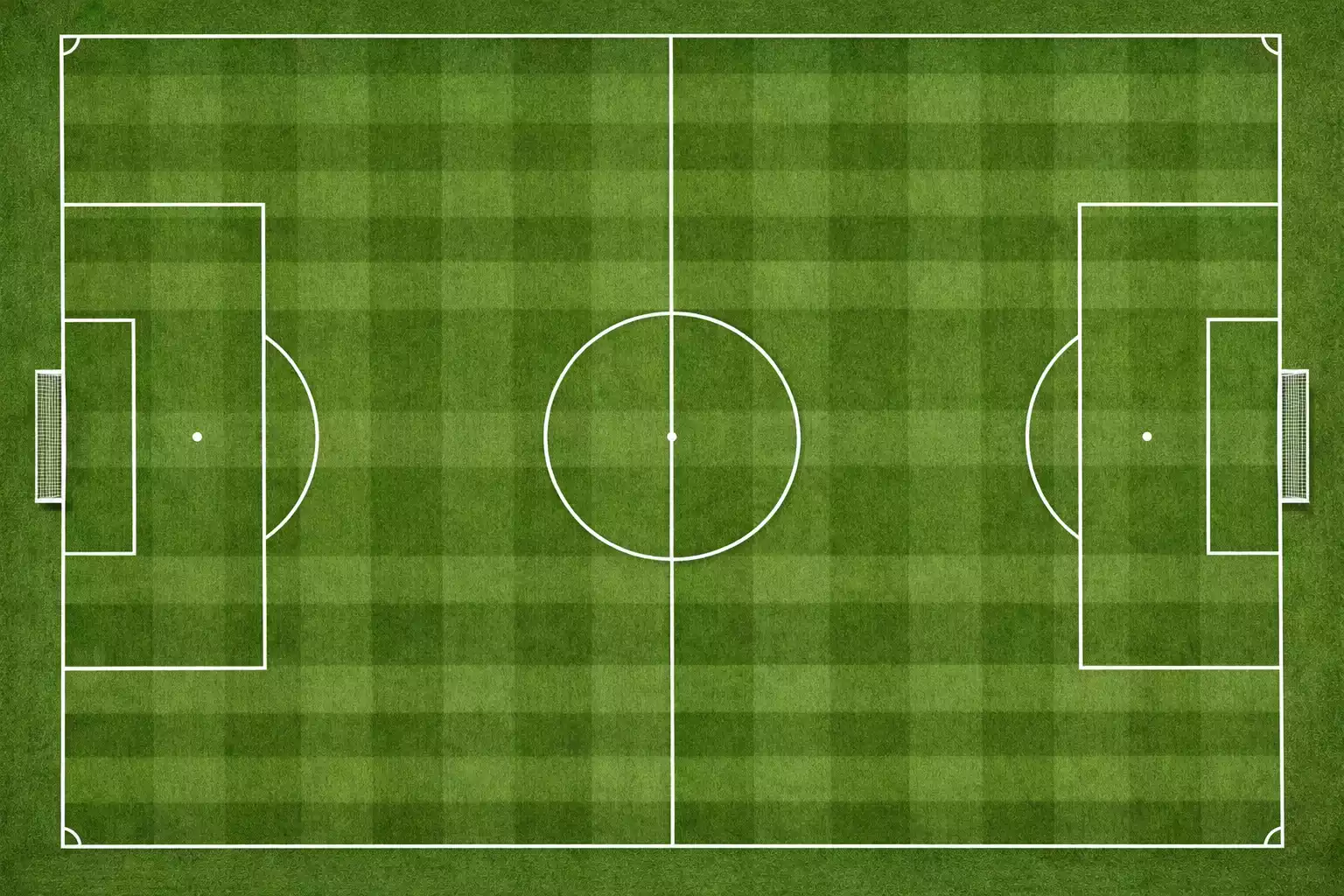 Fußballplatz aus der Vogelperspektive mit sichtbaren Linien und Spielfeld